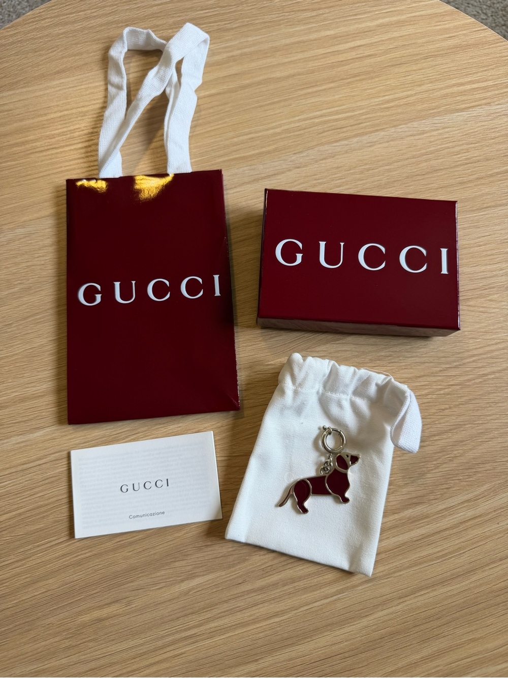Gucci dog-shaped bag charm/keychain